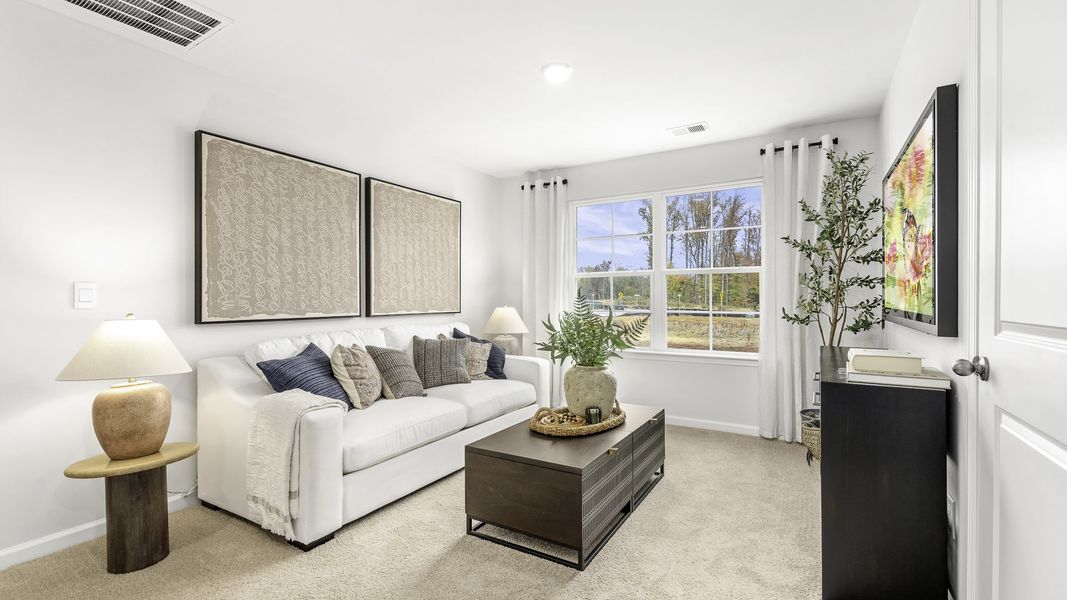 Representative furnished interior of a home built from the Hayden by D.R. Horton in Brookhaven, Greensboro (Image 25).