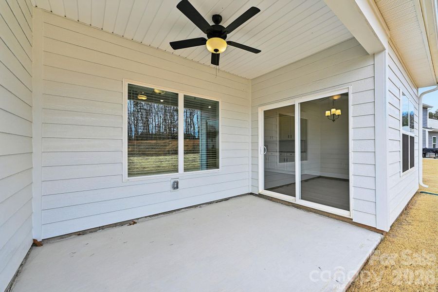 Exterior details and patio area of a home in Colonial Crossing, Troutman (Image 13).