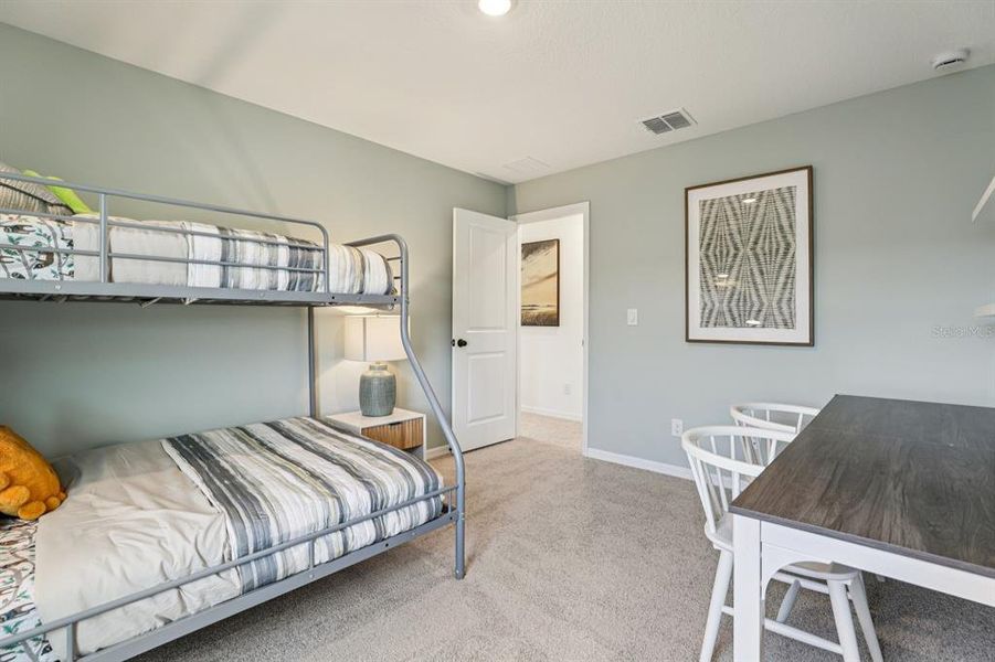 Furnished interior view inside a new home in Hawks Run, Kissimmee (Image 29).