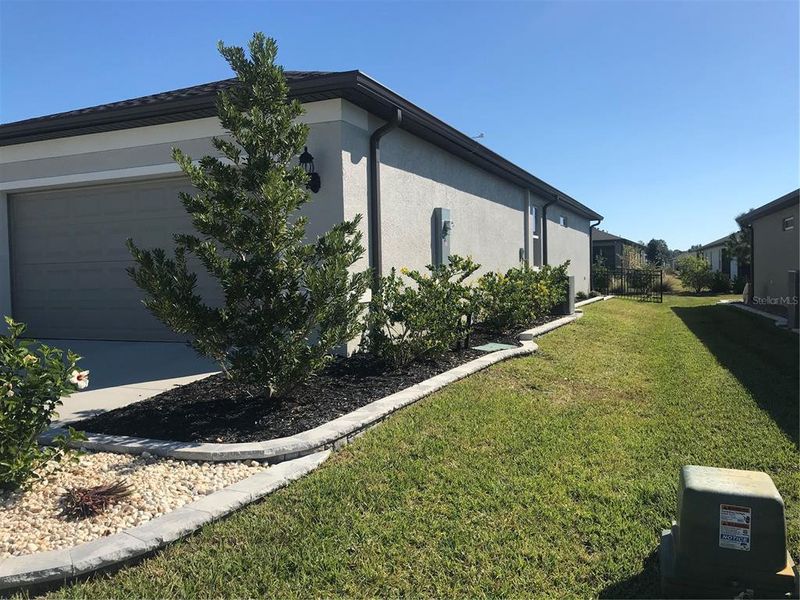 Exterior details and patio area of a home in Del Webb Stone Creek, Ocala (Image 19).