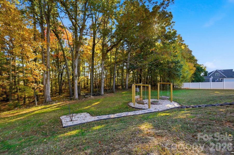 Entertaining Area w/ Fire Pit, Two Swings, and Area for Hammock