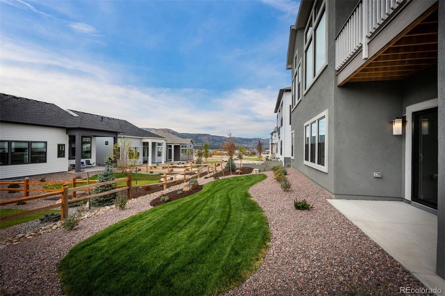Exterior details and patio area of a home in Cloverleaf - Pinnacle Collection, Monument (Image 3).