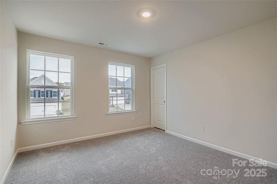 Spacious, unfurnished interior of a new home in Shannon Woods: Walk & Enclave, Maiden (Image 12).