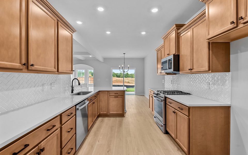 Furnished interior view inside a new home in Fieldstone, Lexington (Image 13).
