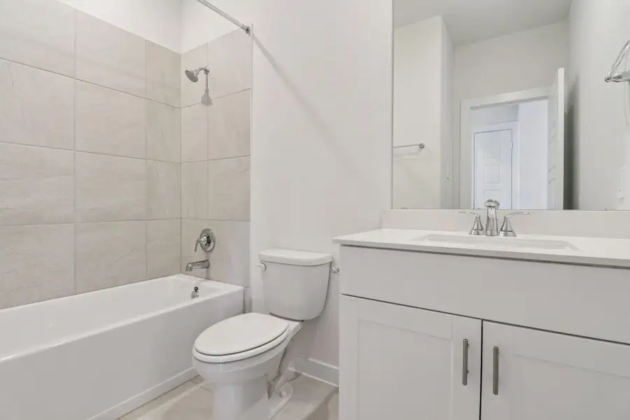 Furnished interior view inside a new home in Pine Lake Cove - Traditional Series, Montgomery (Image 8).