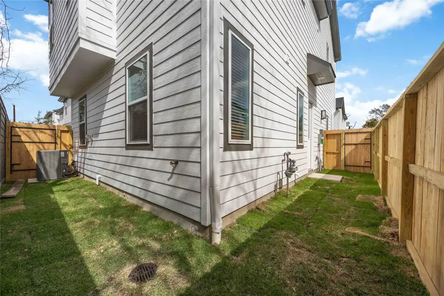 Exterior details and patio area of a home in Fulton Crossing, Houston (Image 4). Exterior details and patio area of a home in Fulton Crossing, Houston (Image 4).