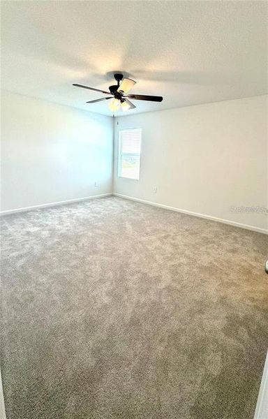 Spacious, unfurnished interior of a new home in Hunt Club Groves, Lake Wales (Image 25).