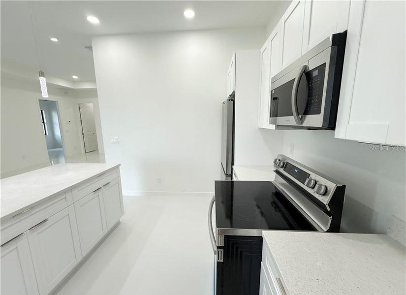 Furnished interior view inside a new home in , Cape Coral (Image 6). Furnished interior view inside a new home in , Cape Coral (Image 6).