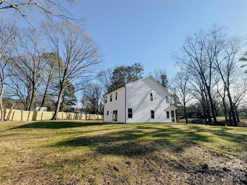 Exterior details and patio area of a home in , Huntersville (Image 23).