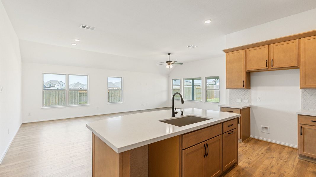 Furnished interior view inside a new home in Sunterra, Katy (Image 21).