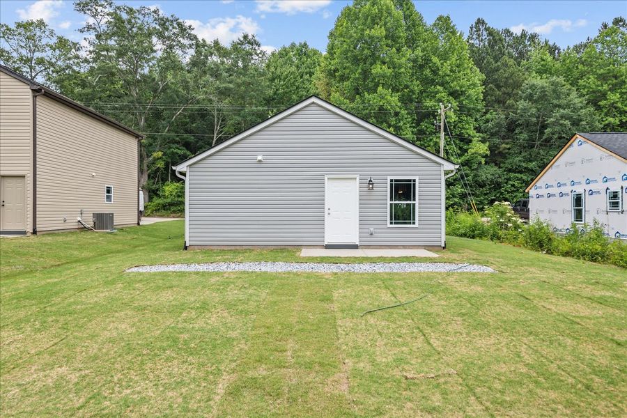 Representative exterior photo of a completed home built from the Elliott by Enchanted Homes in Gentry Place, Spartanburg, SC (Image 13).