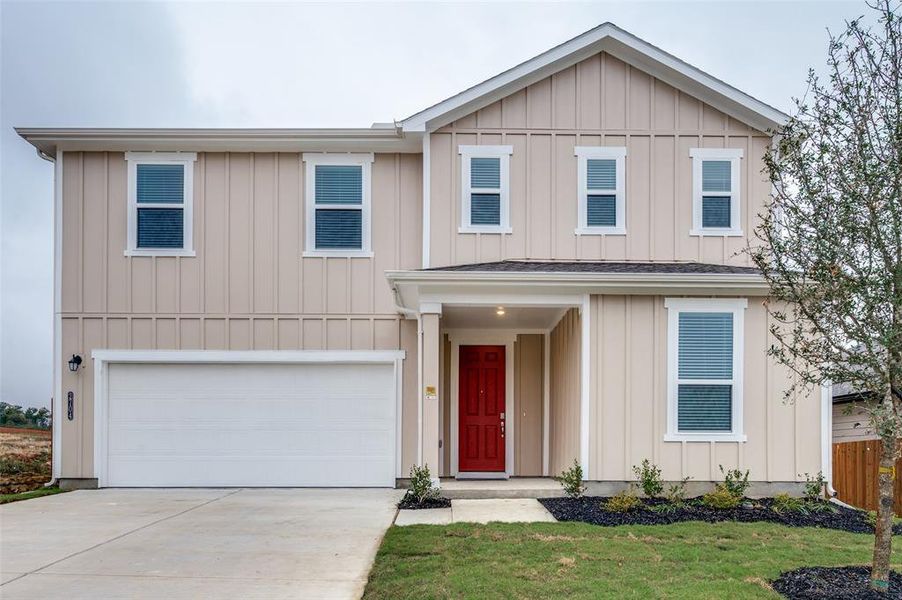 Front exterior of a new home in Eagle Creek, Denton, TX, highlighting curb appeal (Image 1). Front exterior of a new home in Eagle Creek, Denton, TX, highlighting curb appeal (Image 1).