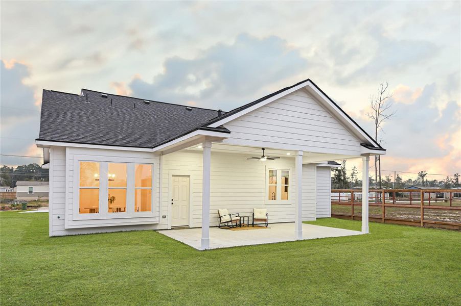 Exterior details and patio area of a home in , Huffman (Image 4). Exterior details and patio area of a home in , Huffman (Image 4).