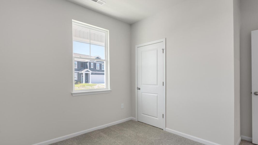 Spacious, unfurnished interior of a new home in Grayson Park, Leland (Image 20). Spacious, unfurnished interior of a new home in Grayson Park, Leland (Image 20).