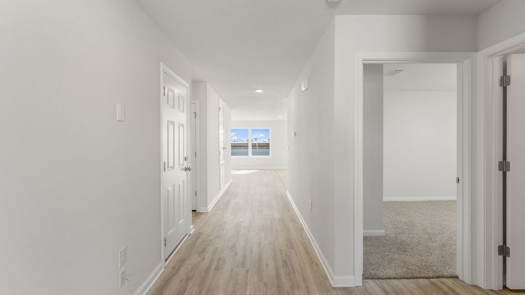 Representative unfurnished interior of a home built from the The Freeport by D.R. Horton in Hodges Bayou Plantation, Panama City (Image 14). Representative unfurnished interior of a home built from the The Freeport by D.R. Horton in Hodges Bayou Plantation, Panama City (Image 14).