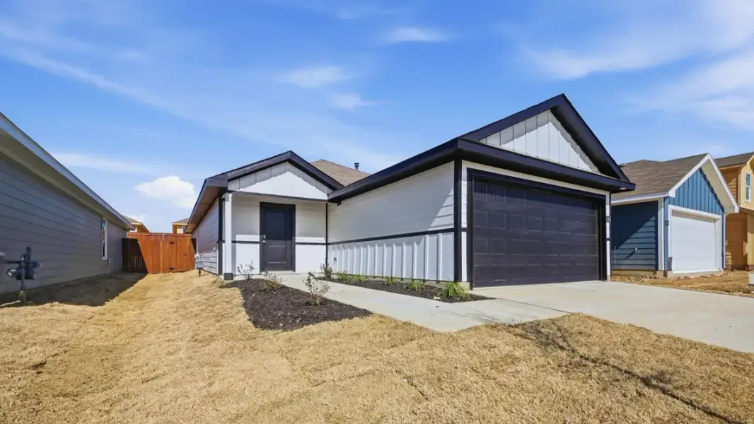 Representative exterior photo of a completed home built from the Estero by D.R. Horton in Ponder Farms, Ponder, TX (Image 19).