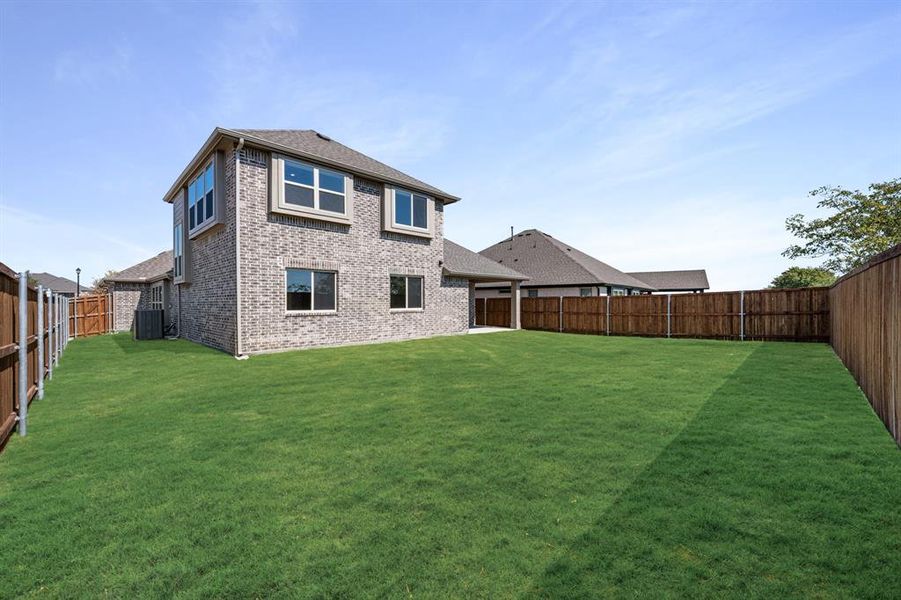 Exterior details and patio area of a home in Stone River Glen 50s, Royse City (Image 4). Exterior details and patio area of a home in Stone River Glen 50s, Royse City (Image 4).
