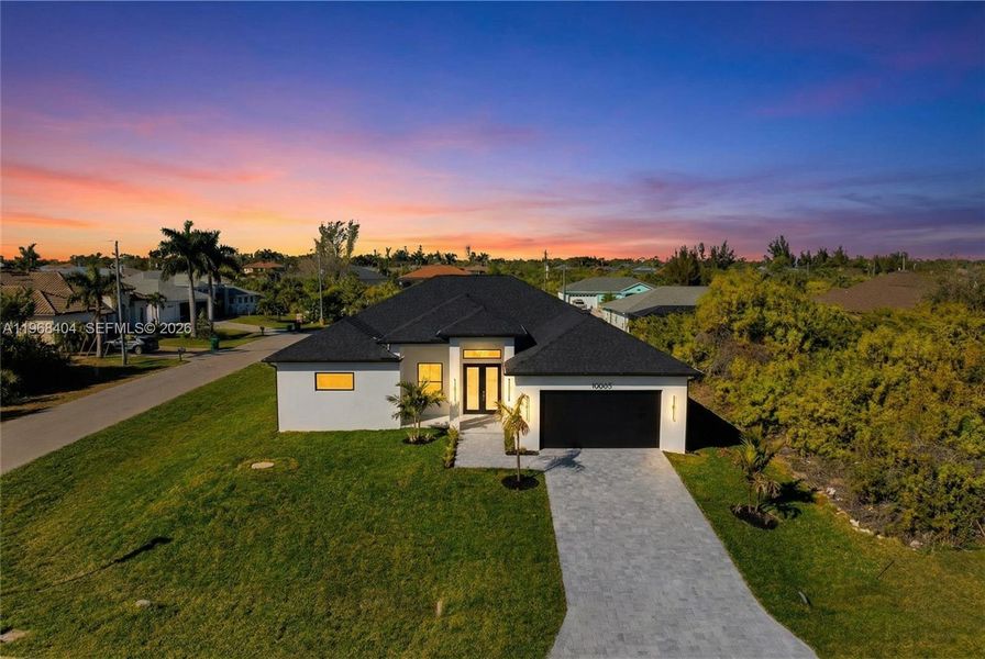 Front exterior of a new home in , Port Charlotte, FL, highlighting curb appeal (Image 23).