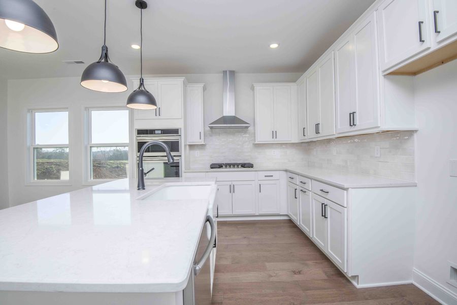 *Photo of example home. Selections and Finishes May Vary.*