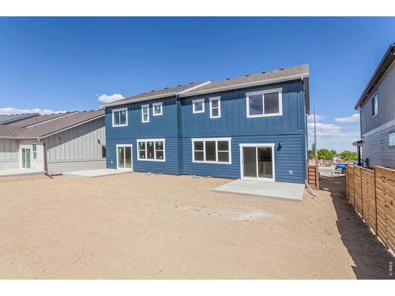 Exterior details and patio area of a home in Wilson Commons, Loveland (Image 3).