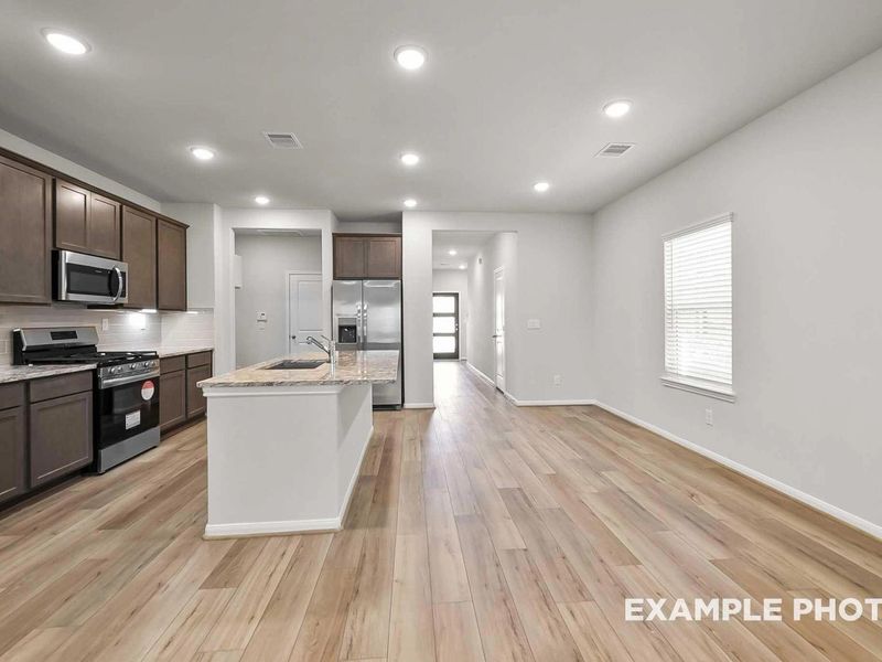Furnished interior view inside a new home in Caney Creek Place, Conroe (Image 10).