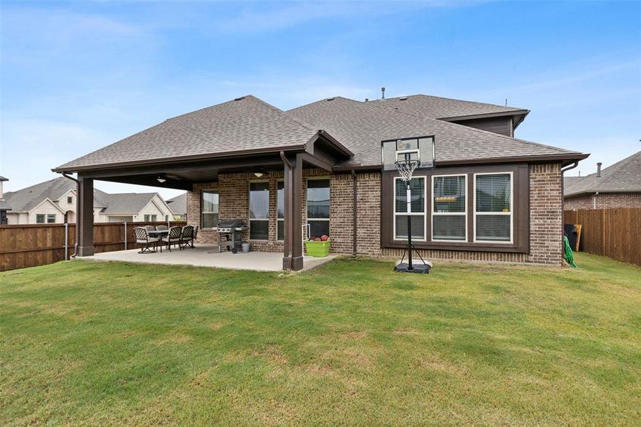 Front exterior of a new home in , Justin, TX, highlighting curb appeal (Image 1).