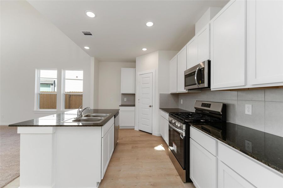 Furnished interior view inside a new home in Granger Pines, Conroe (Image 4).