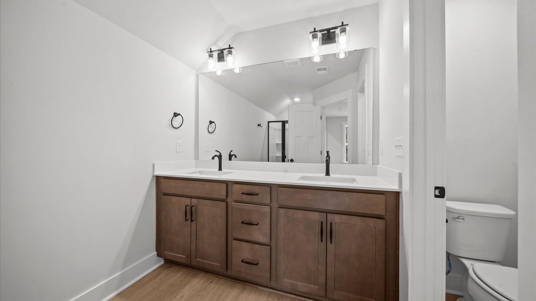 First-class guest bath featuring stylish fixtures and modern design elements