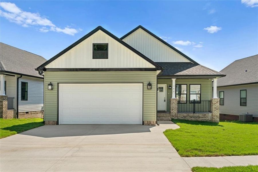 Front exterior of a new home in , Dalton, GA, highlighting curb appeal (Image 2).