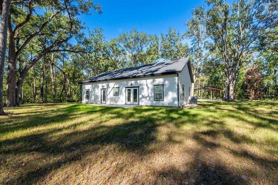 Exterior details and patio area of a home in , Bell (Image 24).