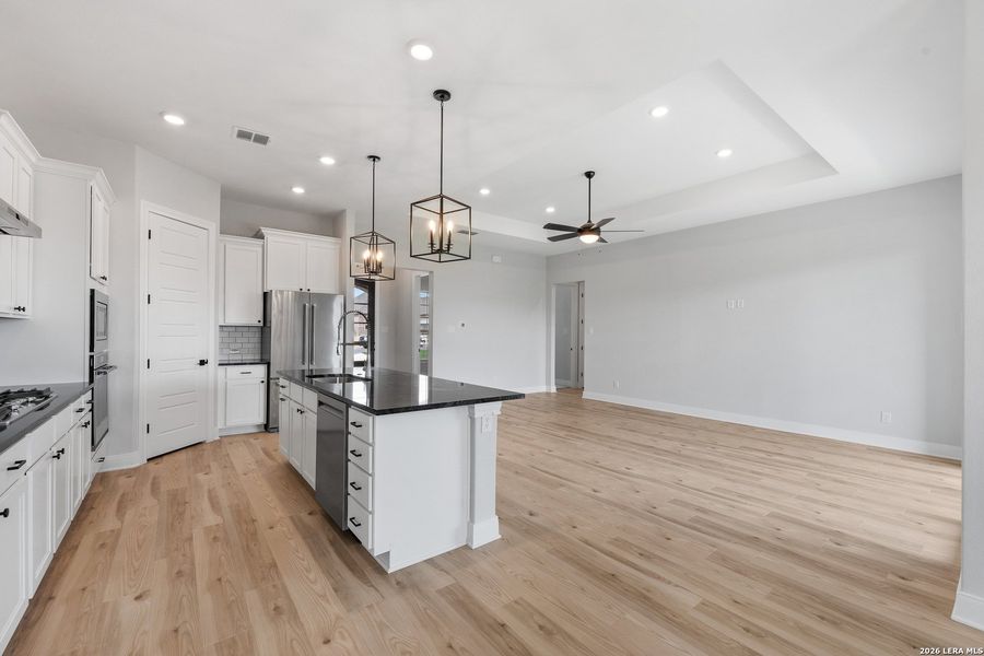 Furnished interior view inside a new home in Potranco West, Castroville (Image 7).