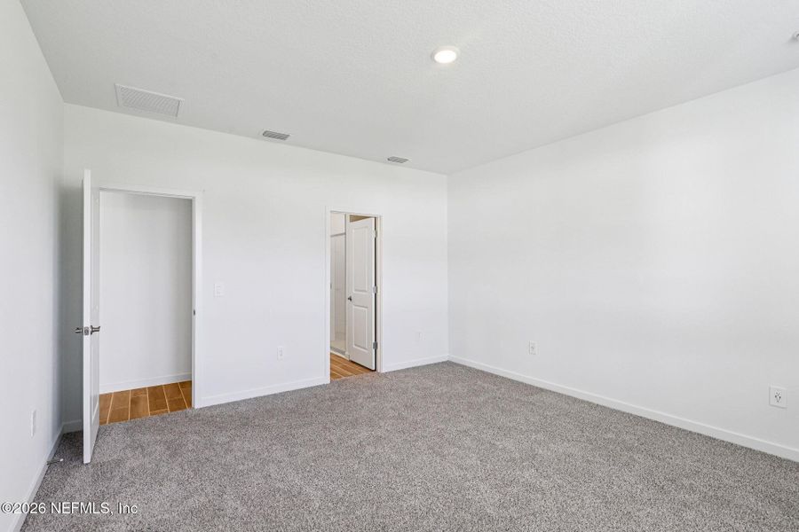 Spacious, unfurnished interior of a new home in Flagler Village - Signature Series, Palm Coast (Image 13). Spacious, unfurnished interior of a new home in Flagler Village - Signature Series, Palm Coast (Image 13).