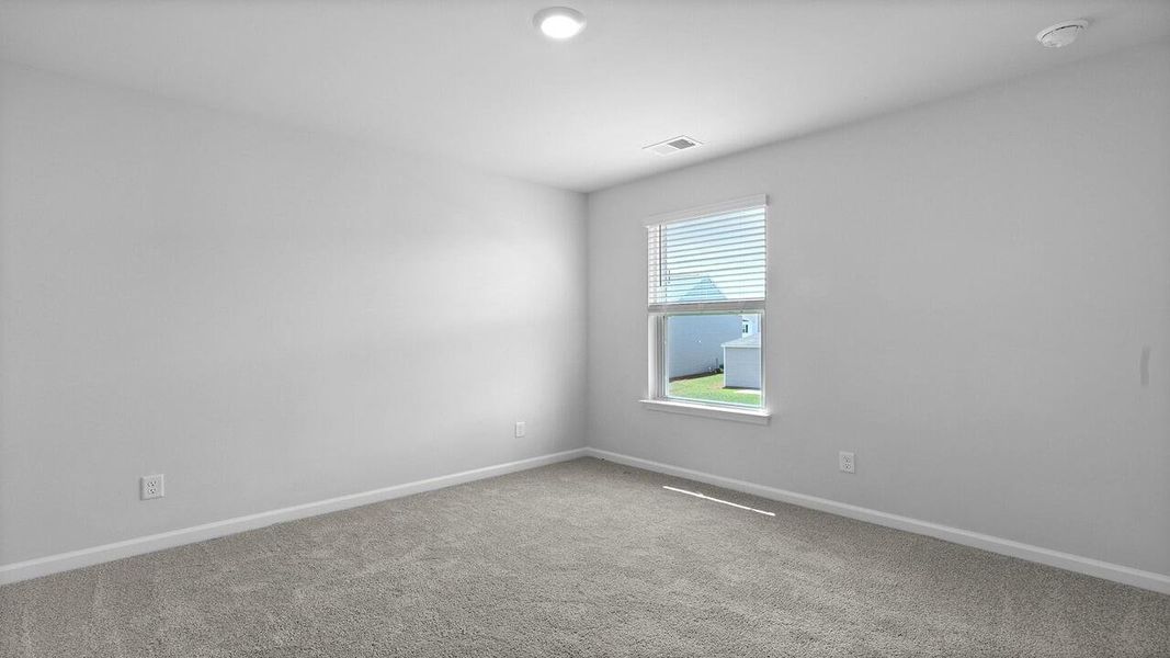 Spacious, unfurnished interior of a new home in Pine Hills at Cane Bay, Summerville (Image 10).