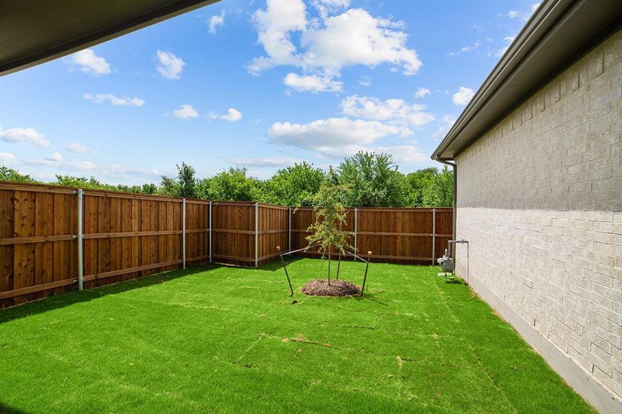 Front exterior of a new home in Karis - Village Series, Crowley, TX, highlighting curb appeal (Image 1). Front exterior of a new home in Karis - Village Series, Crowley, TX, highlighting curb appeal (Image 1).