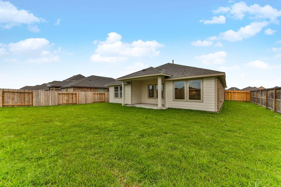 Sample photo of completed home with similar plan. As-built color and selections may vary.