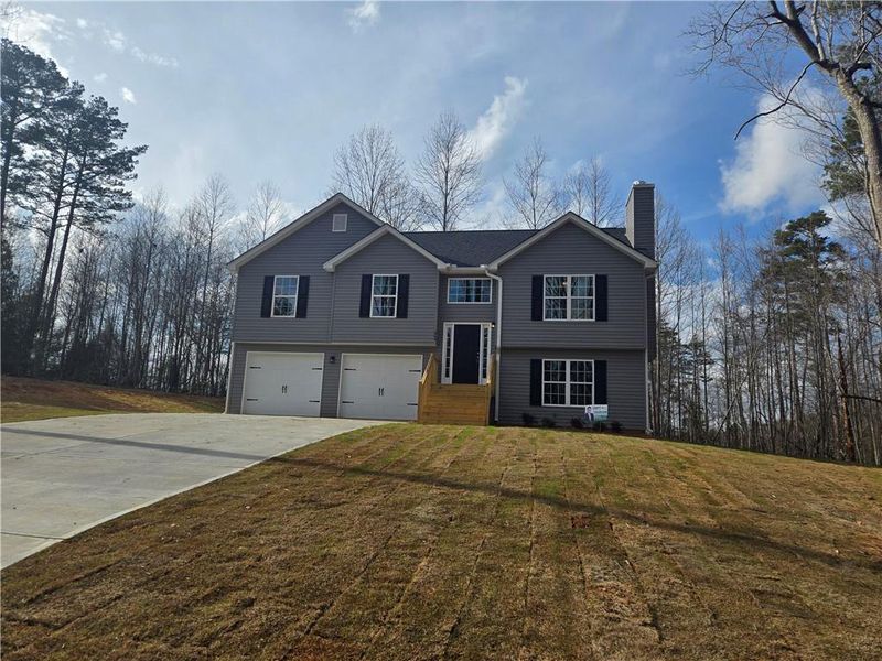 Front exterior of a new home in , Demorest, GA, highlighting curb appeal (Image 17).