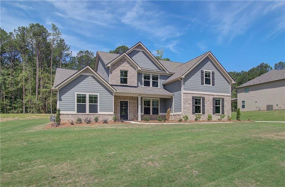 Front exterior of a new home in Riverbend Overlook, Fayetteville, GA, highlighting curb appeal (Image 16).