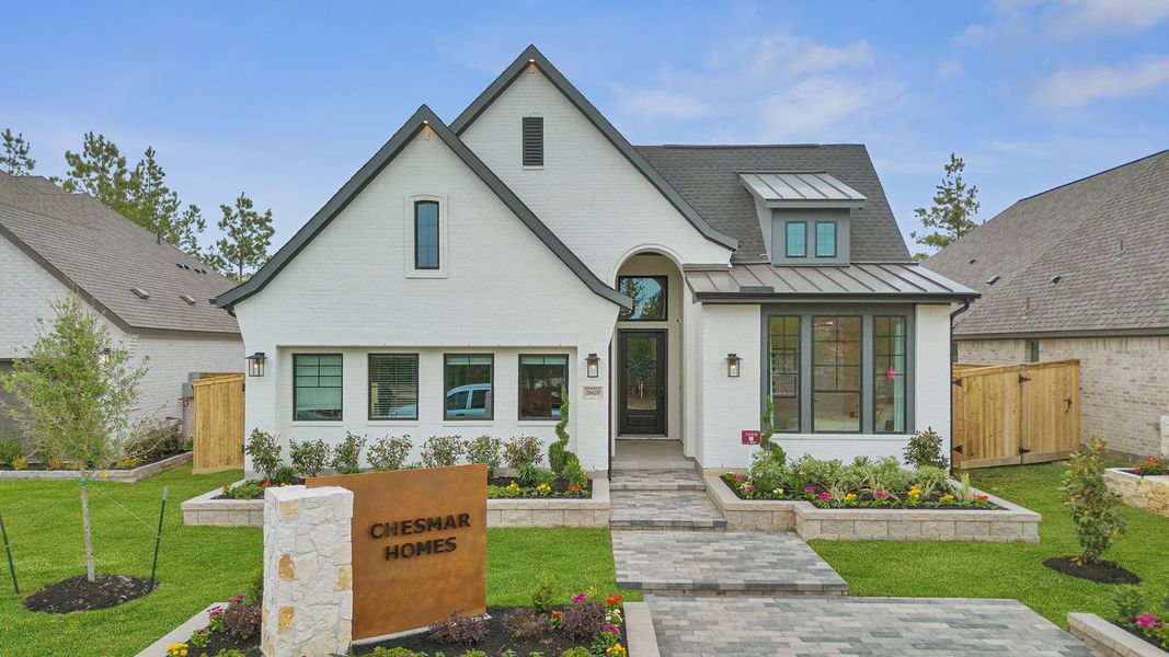 Representative exterior photo of a completed home built from the Hampton by Chesmar Homes in Wildrye 60', Waller, TX (Image 24).