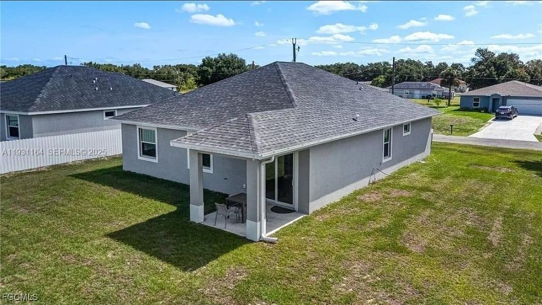 Exterior details and patio area of a home in , Labelle (Image 4).