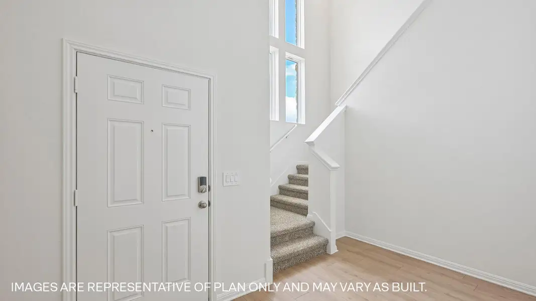 Representative unfurnished interior of a home built from the The Kemah by D.R. Horton in Revelry, Del Valle (Image 15).