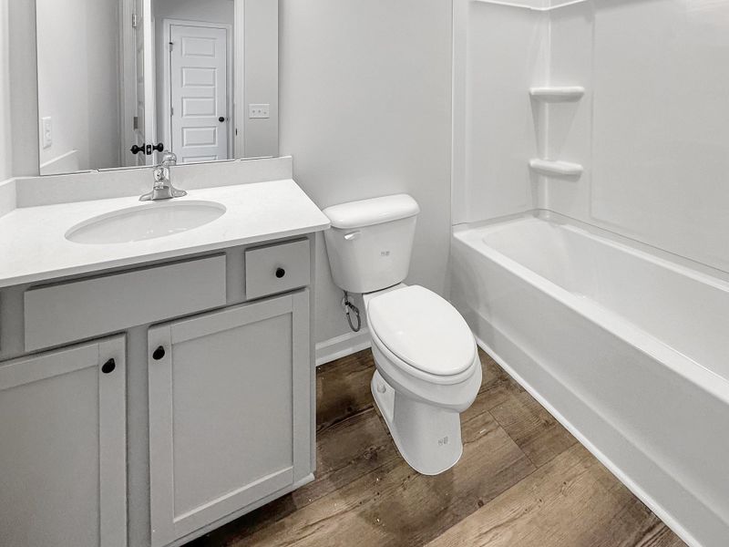 Furnished interior view inside a new home in Grand Reserve, Ludowici (Image 11).