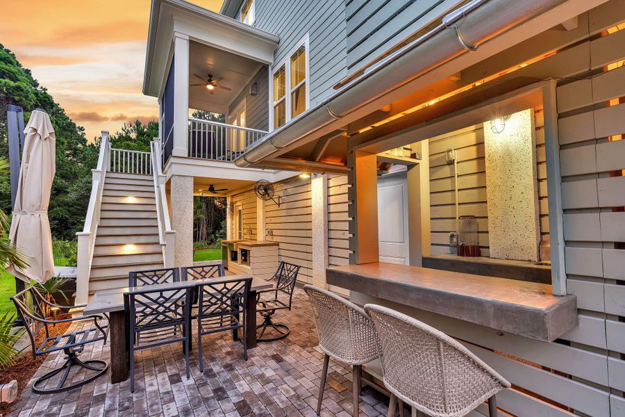 Exterior details and patio area of a home in Overlook at Copahee Sound, Awendaw (Image 26).