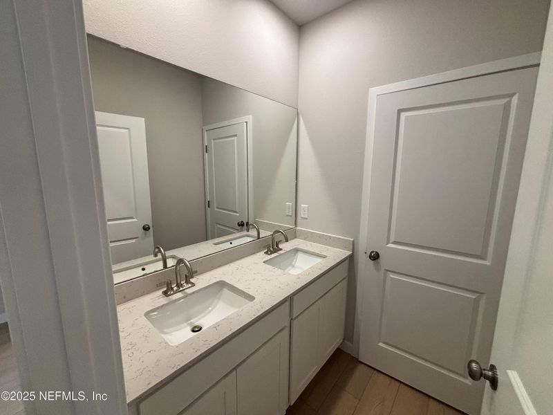 Furnished interior view inside a new home in The Magnolia Series at Reserve East, Flagler Beach (Image 11).