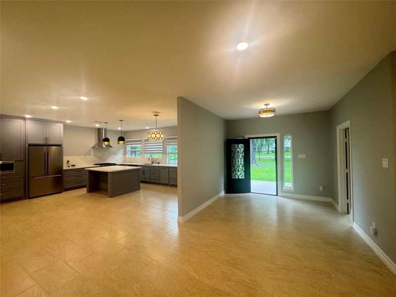 Entrance and kitchen/dining to the left