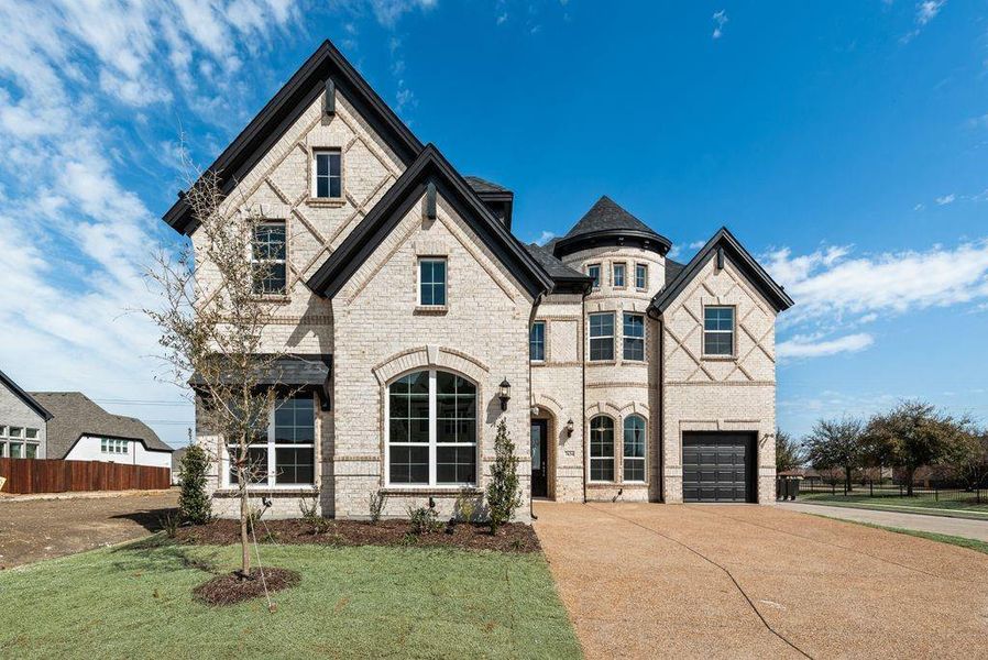 Front exterior of a new home in Cedar Ridge Estates, Grand Prairie, TX, highlighting curb appeal (Image 21). Front exterior of a new home in Cedar Ridge Estates, Grand Prairie, TX, highlighting curb appeal (Image 21).
