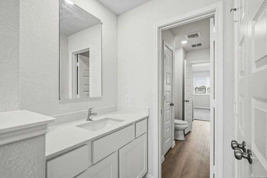 Furnished interior view inside a new home in Cinco Lakes, San Antonio (Image 9).