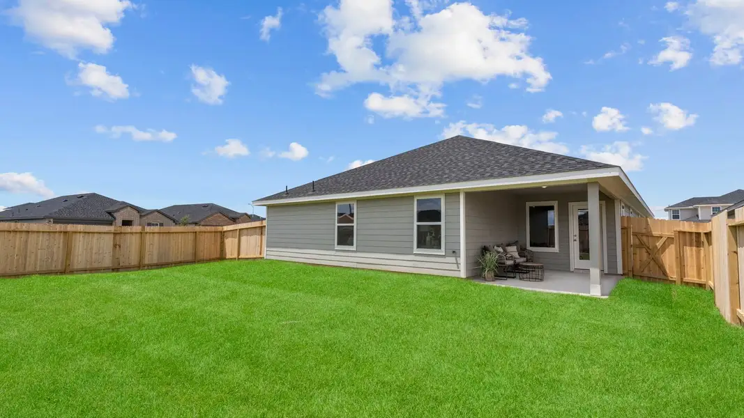 Exterior details and patio area of a home in Emberly, Beasley (Image 3).