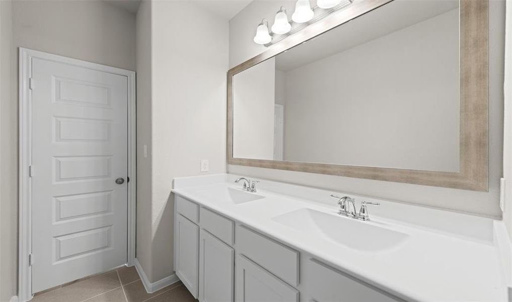 Double sinks in hall bath (*Photo not of actual home and used for illustration purposes only.)