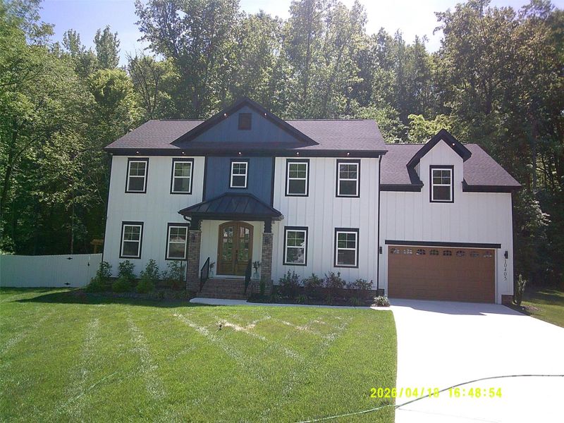 Front exterior of a new home in , Mint Hill, NC, highlighting curb appeal (Image 21).
