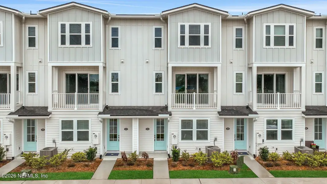 Front exterior of a new home in , Jacksonville Beach, FL, highlighting curb appeal (Image 22).